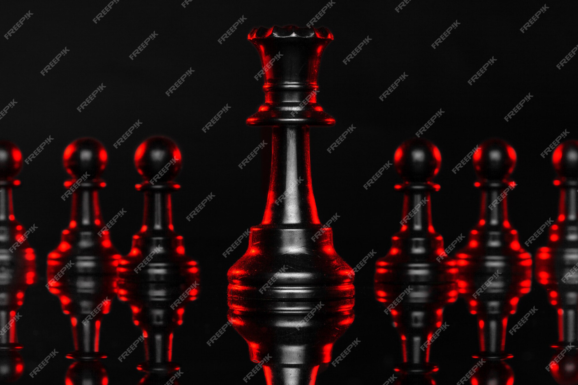 Premium Photo  Chess pieces on dark with red backlight close up