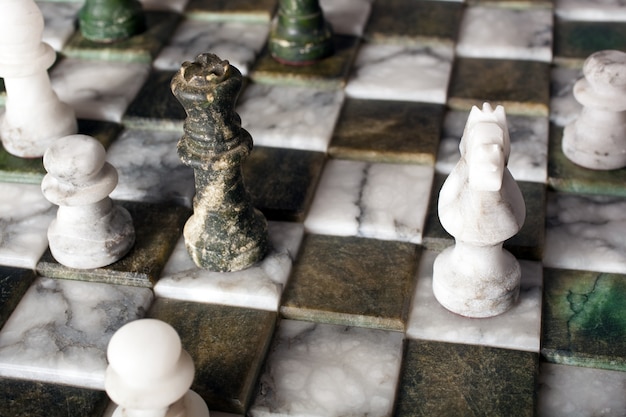 Chess pieces on a marble board