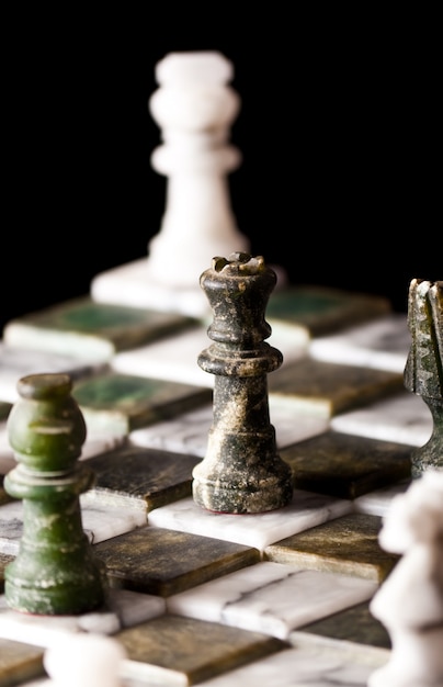 Chess pieces on a marble board