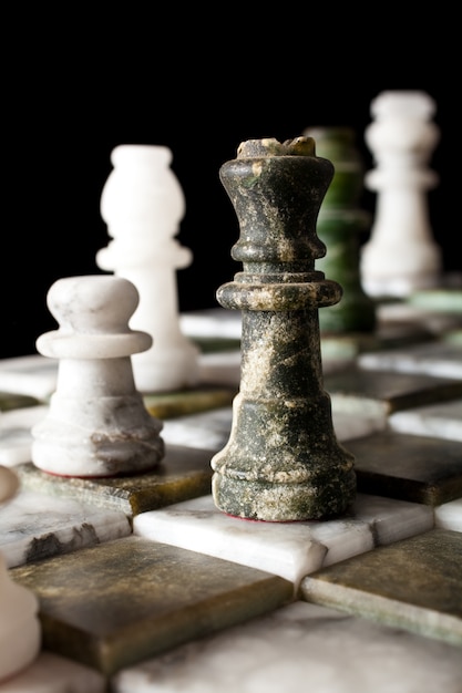 Chess pieces on a marble board