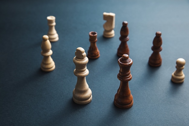 Chess stones on the dark background