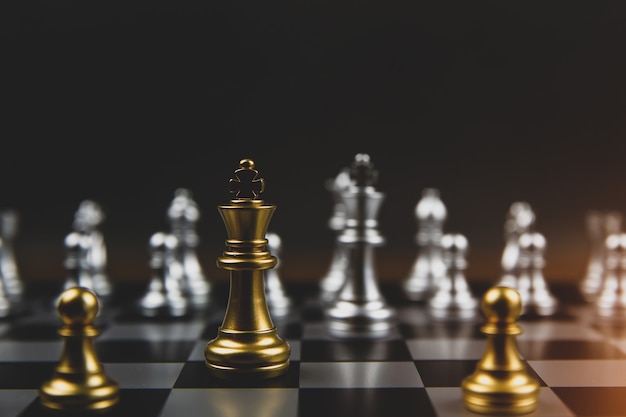 Chess team standing on the board.