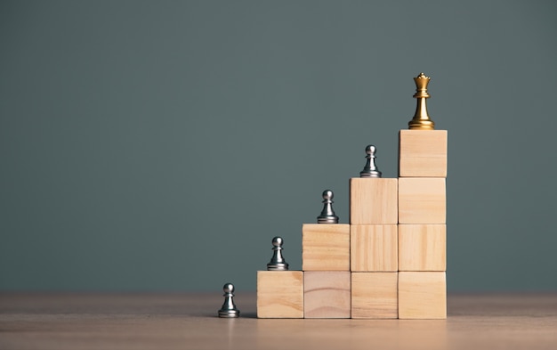 Chess on the wooden blocks on the table