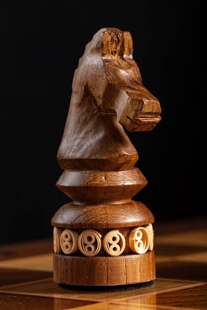 Chess wooden figure black horse