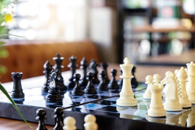 Chessboard play Chess game on the table 