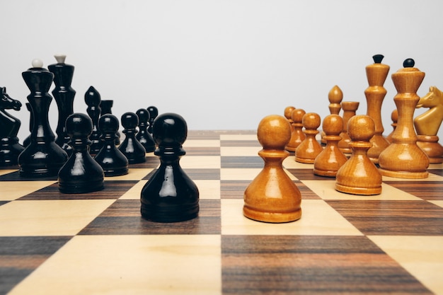 Chessboard with wooden figures