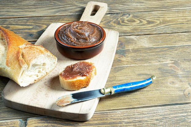 Chestnut cream traditional French sweet chestnut spread for desserts on a wooden table