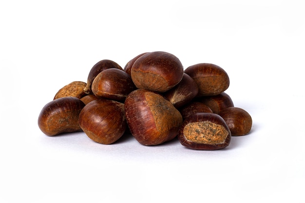 Chestnuts on a white background, horizontal, raw, no people,. High quality photo
