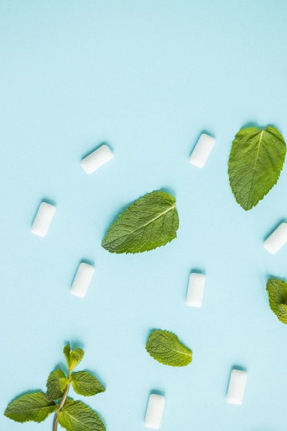 Chewing gum with mint on blue background