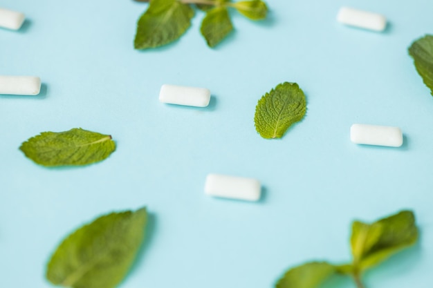 Chewing gum with mint on blue background