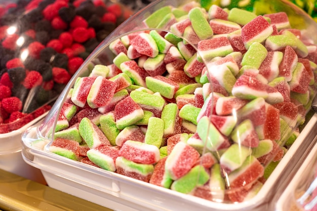 Chewy jelly sweets on the counter of a candy store