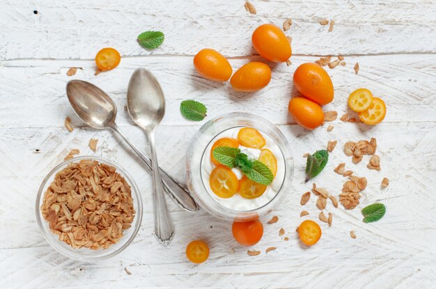 Chia pudding parfait, layered with kumquat  and granola