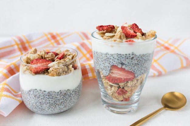 Chia pudding with almond milk, yogurt, and dried strawberries