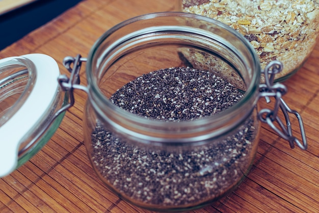 Photo chia seed in a glass hermetic jar