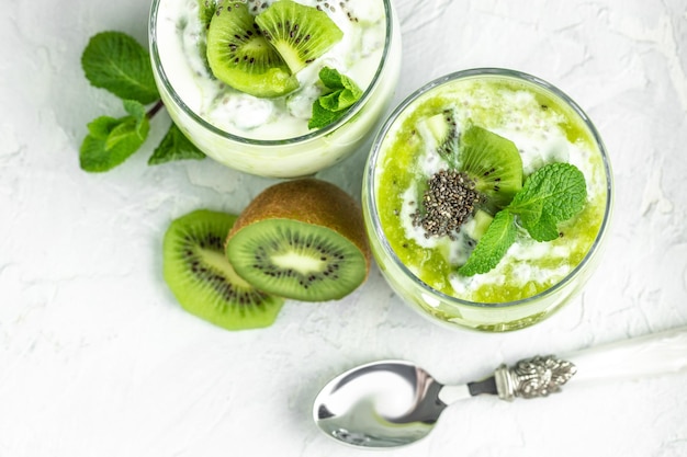 Chia seed pudding made with lactosefree yogurt kiwi and mint Delicious breakfast or snack banner menu recipe place for text