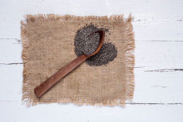 Chia seed on wooden board