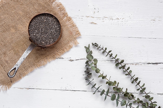 Chia seed on wooden board