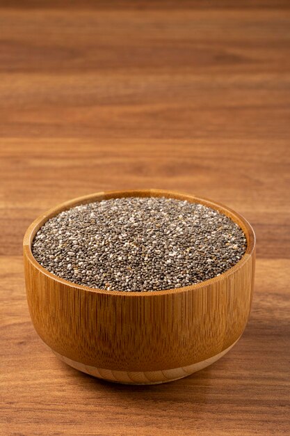 Chia seed in wooden bowl.