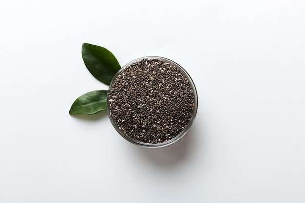 Chia seeds in bowl on colored background Healthy Salvia hispanica in small bowl Healthy superfood