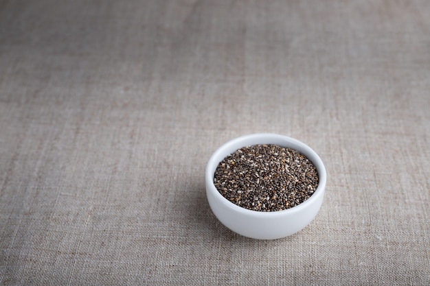 Chia seeds in a bowl on the table