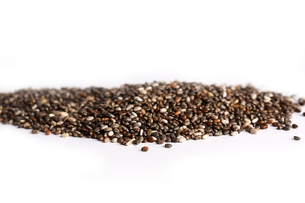 Chia seeds isolated on white background selective focus