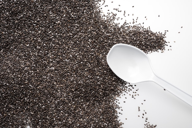 Photo chia seeds isolated with white background