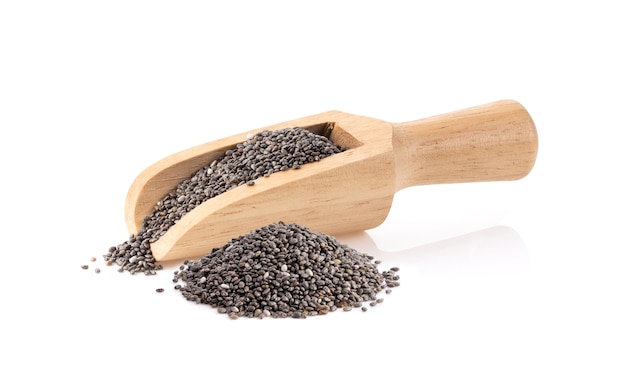 Chia seeds in wood scoop isolated on white background