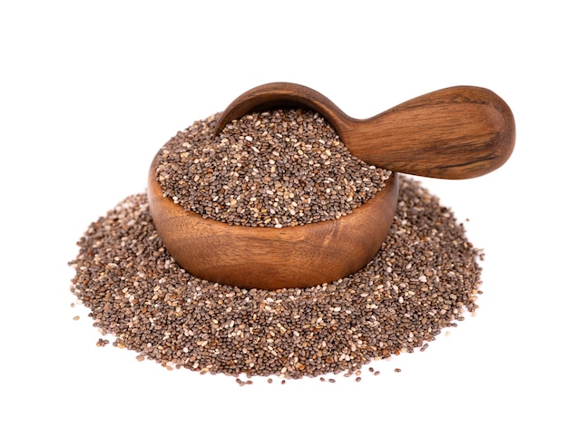 Chia seeds in wooden bowl and spoon, isolated on white background. Organic chia seeds.