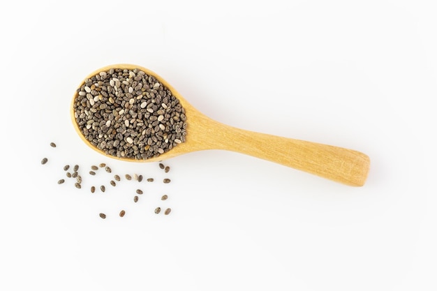Chia seeds in wooden spoon Isolated on white background