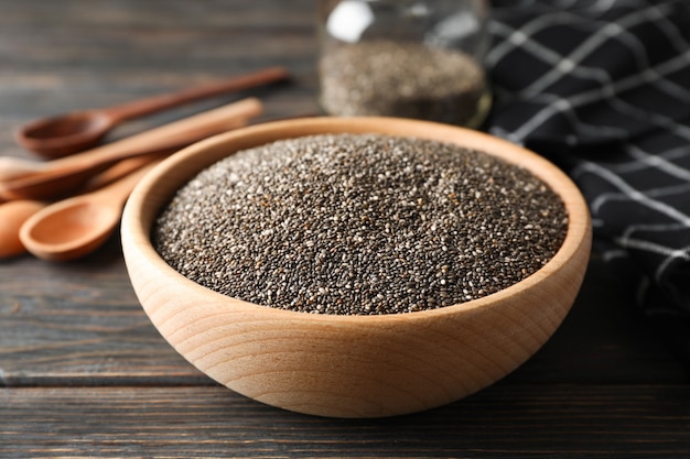 Chia in wooden bowl on wood