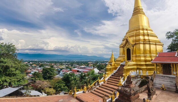 Chiang Mai city landscape with Wat Phra That Doi Kham temple stair and couldy sky