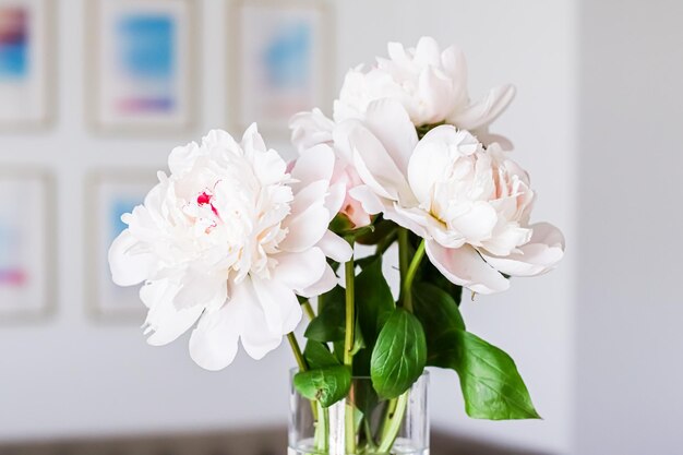 Chic bouquet of peony flowers in vase as home decor idea luxury interior design and decoration