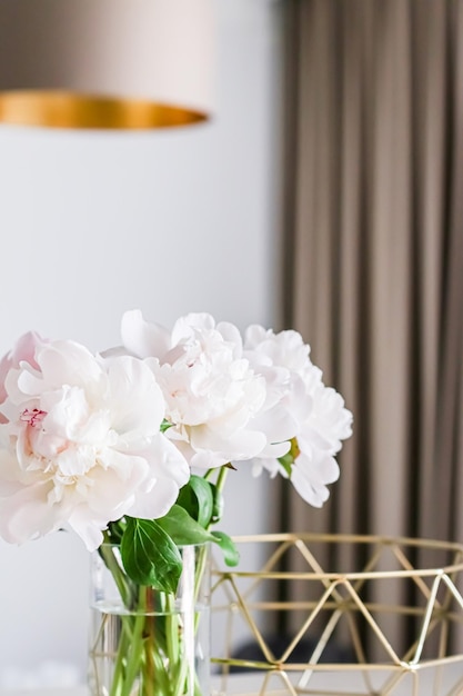 Chic bouquet of peony flowers in vase as home decor idea luxury interior design and decoration