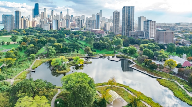 Chicago skyline aerial drone view from above, lake Michigan and city of Chicago downtown skyscrapers cityscape bird's view from park, Illinois, USA