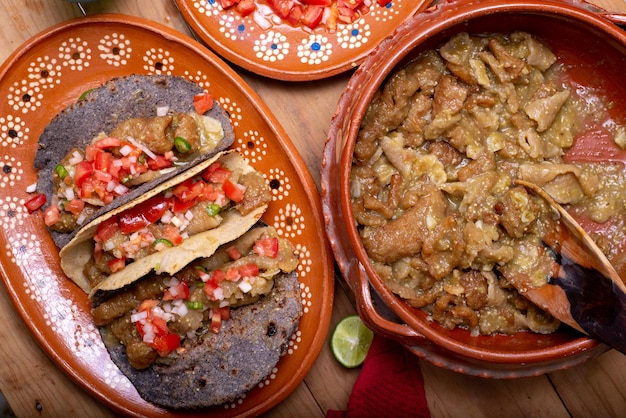 Chicharrones in green sauce tacos Typical mexican food