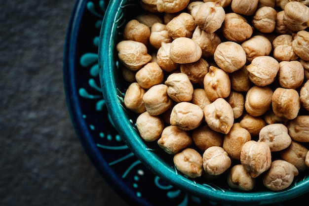 Chick pea in blue authentic bowl on dark