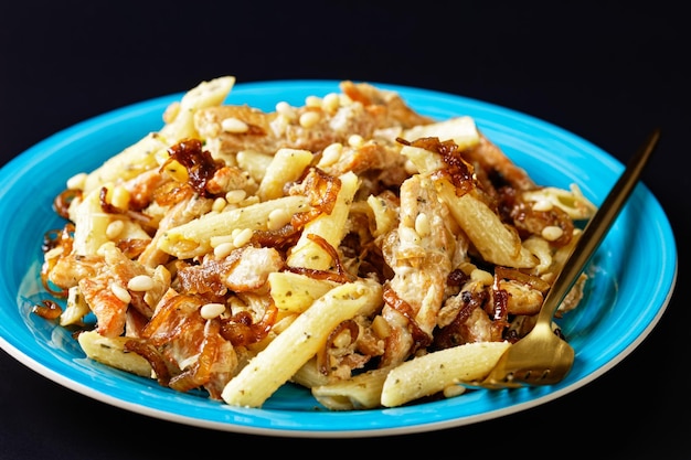 Chicken alfredo pasta penne with caramelized onion