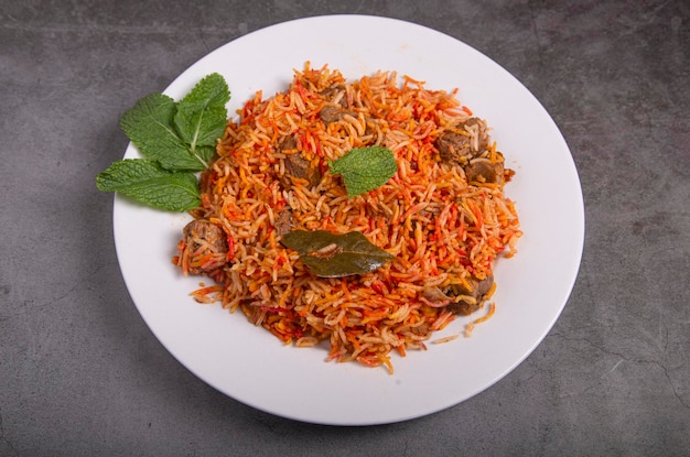 Chicken biryani rice dish with mint Top view Pakistani and Indian dish