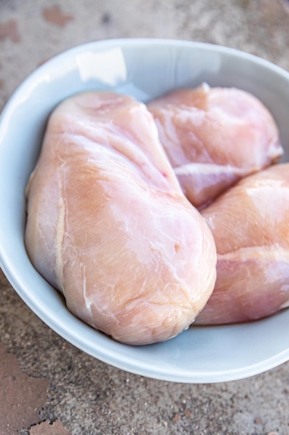 鶏の胸肉新鮮な生の家禽肉新鮮な健康的な食事食品ダイエットスナックコピー宇宙食の背景