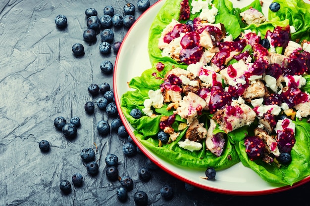 Chicken breast salad, greens, blueberries