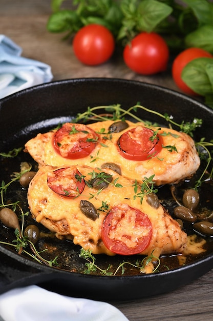 Chicken breast with cheese and tomatoes