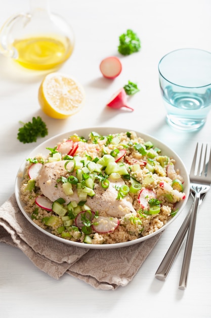 Chicken breast with couscous, cucumber, avocado, spring onion, radish. healthy lunch