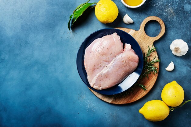 Chicken breast with lemons, rosemary and pepper