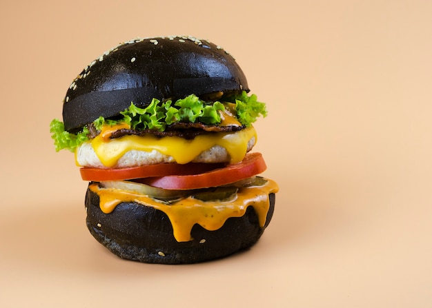 Chicken burger in a black bun