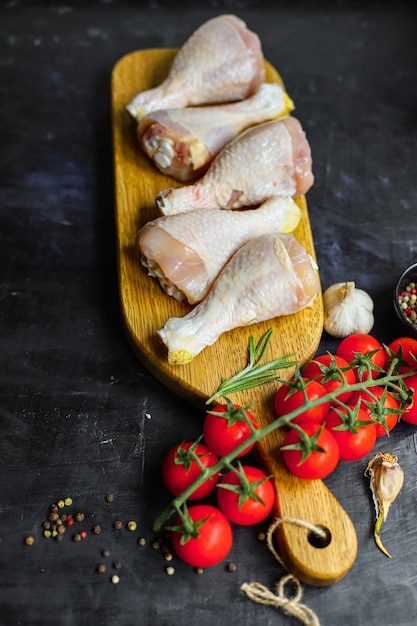 chicken drumsticks raw meat for cooking ready to eat on the table healthy meal