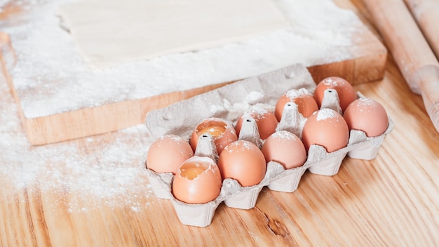 Chicken eggs in a carton pack were used to make a dough