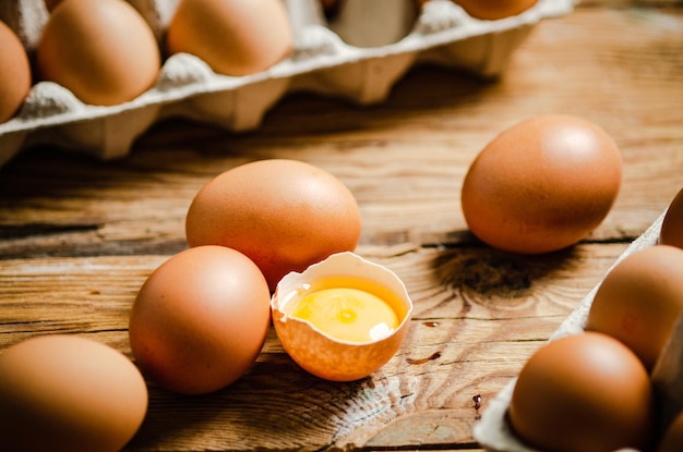 Chicken eggs on a wooden table