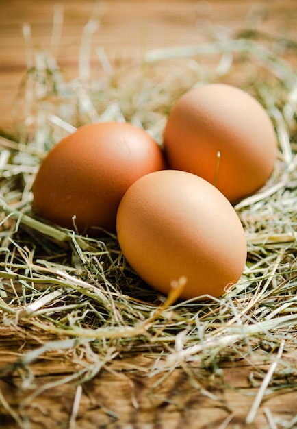 Chicken eggs on a wooden table