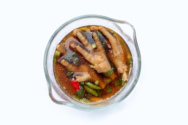 Chicken feet in spicy soup