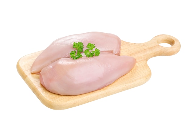 Chicken fillet breast on cutting board isolated on white background